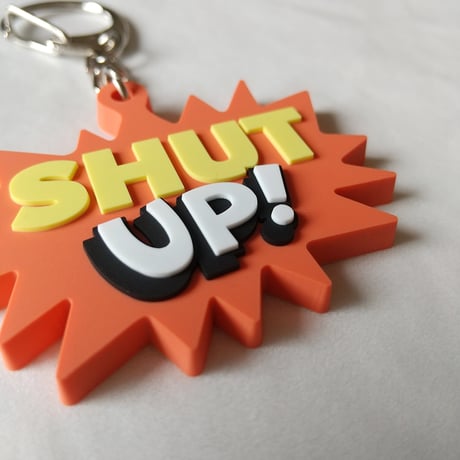 DONATION（寄付3,000円）→キーホルダー：SHUT UP!（オレンジ）