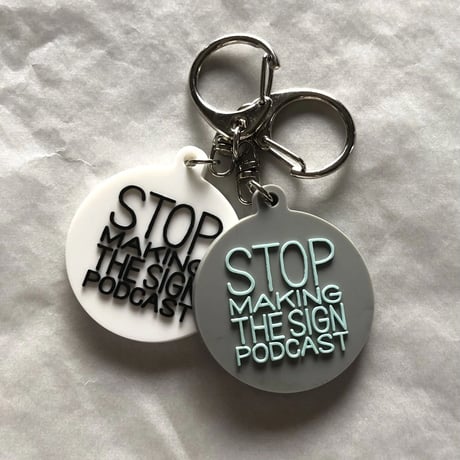 DONATION (寄付3,000円)→キーホルダー：STOP MAKING THE SIGN PODCAST（グレー×ホリゾンブルー）
