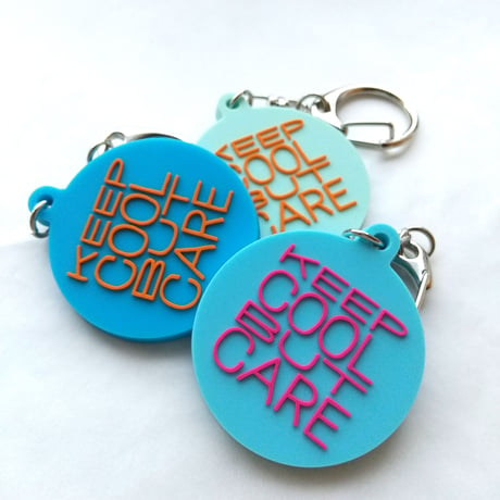 DONATION (寄付3,000円)→キーホルダー：KEEP COOL BUT CARE（シアンブルー×マゼンタピンク）