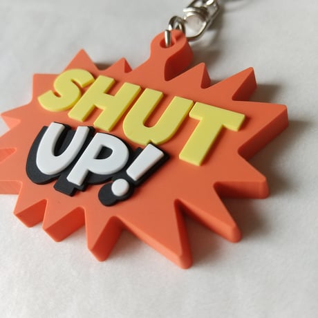 DONATION（寄付3,000円）→キーホルダー：SHUT UP!（オレンジ）
