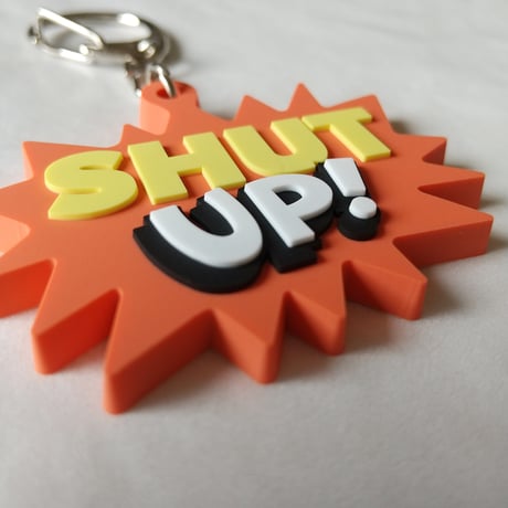 DONATION（寄付3,000円）→キーホルダー：SHUT UP!（オレンジ）