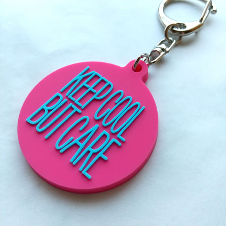 DONATION (寄付3,000円)→キーホルダー：KEEP COOL BUT CARE ver.2（マゼンタピンク×シアンブルー）