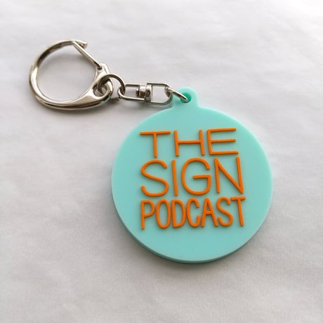 DONATION (寄付3,000円)→キーホルダー：THE SIGN PODCAST（ホリゾンブルー×オレンジ）