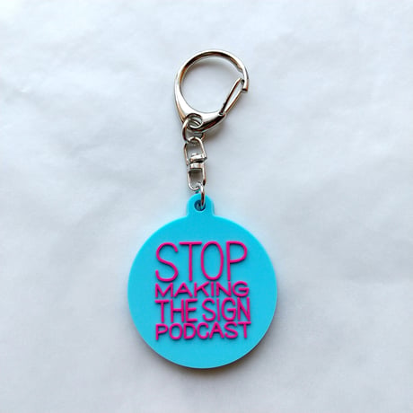 DONATION (寄付3,000円)→キーホルダー：STOP MAKING THE SIGN PODCAST（シアンブルー×マゼンタピンク）
