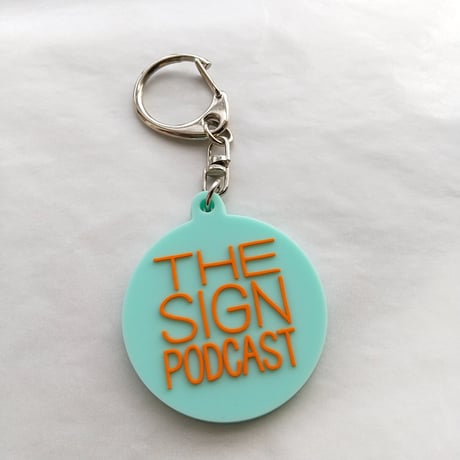 DONATION (寄付3,000円)→キーホルダー：THE SIGN PODCAST（ホリゾンブルー×オレンジ）
