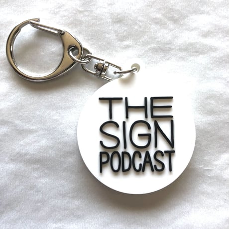 DONATION (寄付3,000円)→キーホルダー：THE SIGN PODCAST（ホワイト×ブラック）