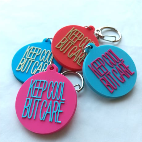 DONATION (寄付3,000円)→キーホルダー：KEEP COOL BUT CARE ver.2（マゼンタピンク×シアンブルー）