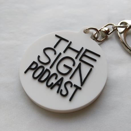 DONATION (寄付3,000円)→キーホルダー：THE SIGN PODCAST（ホワイト×ブラック）