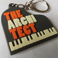 DONATION（寄付3,000円）→キーホルダー：THE ARCHITECT ピアノ（オレンジ）
