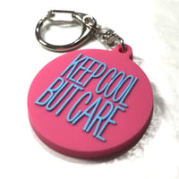 DONATION (寄付3,000円)→キーホルダー：KEEP COOL BUT CARE ver.2（マゼンタピンク×シアンブルー）