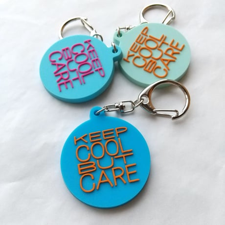 DONATION (寄付3,000円)→キーホルダー：KEEP COOL BUT CARE（コバルト×オレンジ）