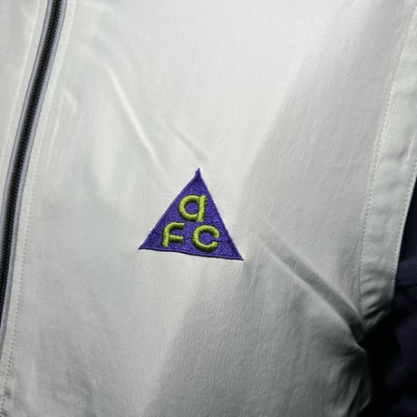 AFC △ One Point Embroidery Nylon Track Vest｜AFC △ ワンポイント エンブロイダリー ナイロン トラックベスト