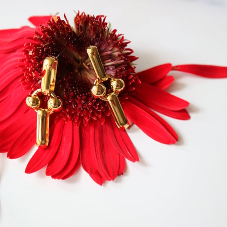 【nikori】　  cross swing earring