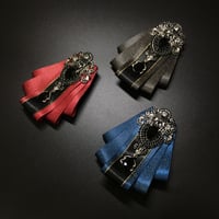 【アクセサリー】勲章：漆黒の宝石