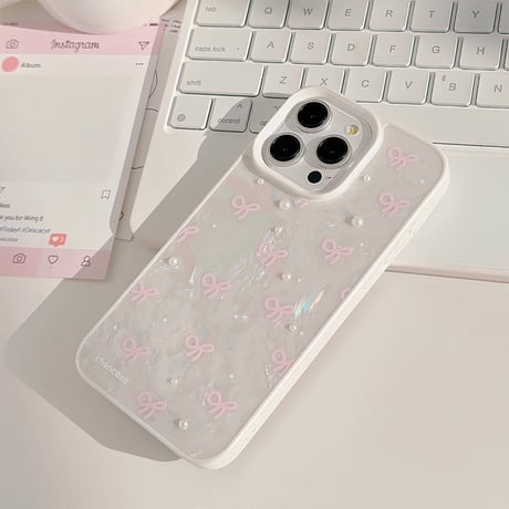 シェル風 iPhone15/15proケース パールリボン柄 iPhone14/13pro/12カバー ストラップ付 女子力アップ[M4524]