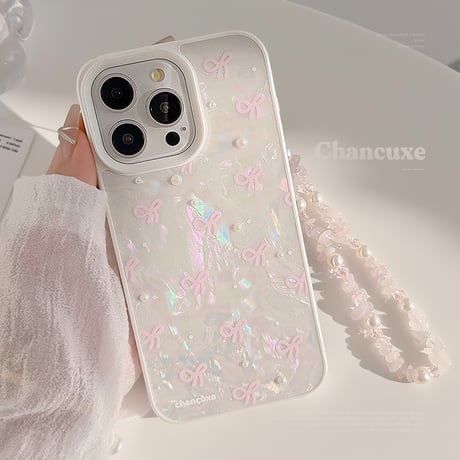 シェル風 iPhone15/15proケース パールリボン柄 iPhone14/13pro/12カバー ストラップ付 女子力アップ[M4524]