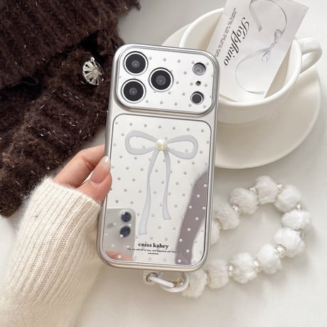 リボン柄ミラー iPhone17pro/17ケース パールデコ 水玉模様 iPhone16/15proケース 可愛い毛玉ストラップ 女子力高い[M6055]