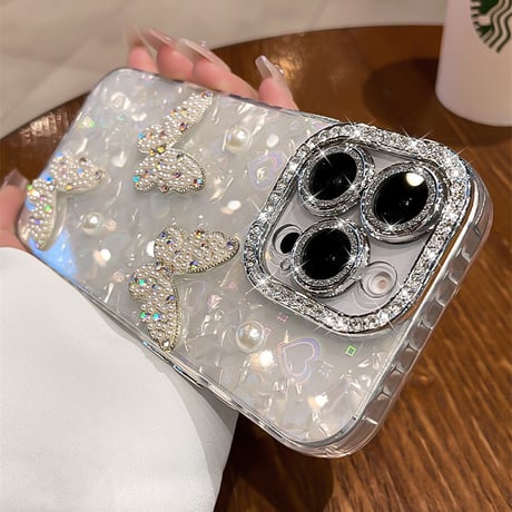 ジュエリー/パールデコ iPhone17/16promaxカバー 蝶々 カメラカバー iPhone15/14/13ケース 綺麗ストラップ キラキラハート入りシェル柄[M5590]