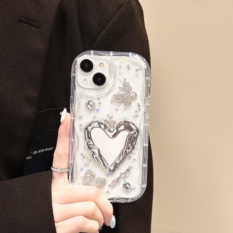 ハートミラー iPhone15/16proケース キラキラ蝶 アイフォン14/13pro/12ケース 女子力アップ うねうね[M4529]