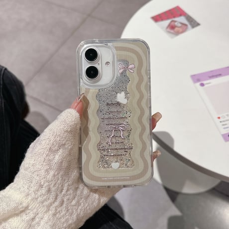 動くグリッター iPhone16pro/16ケース リボン うねうね iPhone15/14pro/13promaxカバー 女子力高い  [M5112]