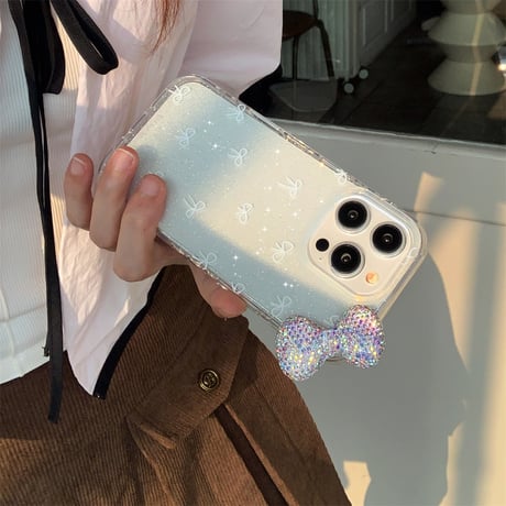 リボン iPhone16/16Proケース ダイヤリボン ラメ入り iPhone15Pro/14/13Proカバー キラキラ めっちゃ可愛い 高級感 [M4690]