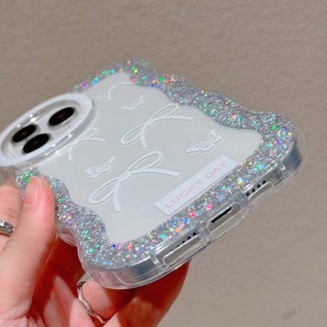 うねうね iPhone15/15proケース リボン柄 ラメ入り iPhone14pro/13/12カバー 女子力高い 落下防止 [M4535]