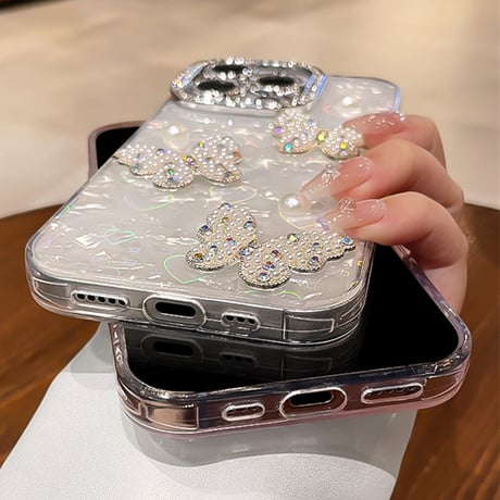 ジュエリー/パールデコ iPhone17/16promaxカバー 蝶々 カメラカバー iPhone15/14/13ケース 綺麗ストラップ キラキラハート入りシェル柄[M5590]