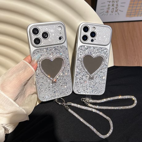 オシャレ便利 iPhone17pro/17ケース ハート型スタンド キラキラ感 iPhone16promax/15proケース ジュエリーストラップ ダイヤカメラカバー[M6243]