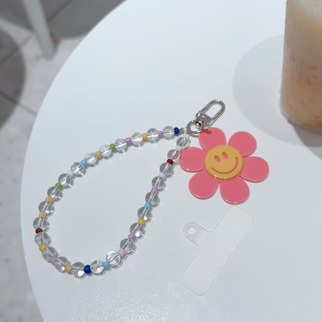 笑顔の花 スマホストラップ キラキラ感 お洒落 バックチャーム キーホルダー iPhone、Xperia、AQUOS、Xiaomi、Galaxy 対応 [M6295]