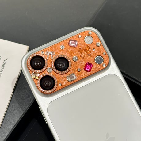 リボンとダイヤデコレンズカバー iPhone17ProMax/17Pro カメラレンズフィルム  金属製  おしゃれ  頑丈 キラキラ 耐久性耐衝撃 [M6506]