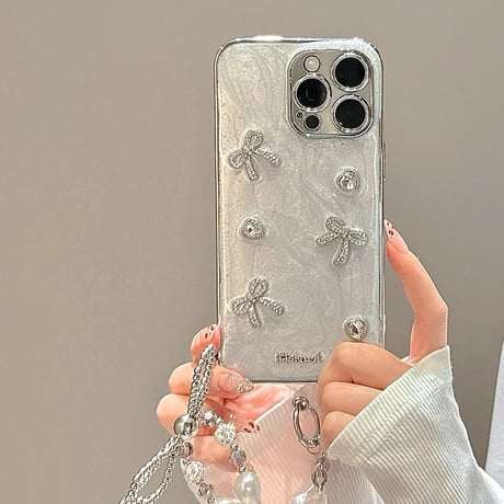 女子力アップ iPhone15Pro/15promaxカバー リボンデコアイフォン14プロ/13/12ケース きれいストラップ 2色 [M4367]
