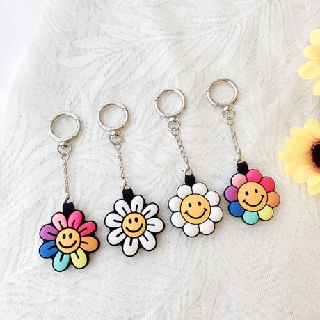 笑顔の花 AirTagケース  sunflower 可愛い エアタグカバー  キーホルダー付きソフトケース 耐久性ありM576