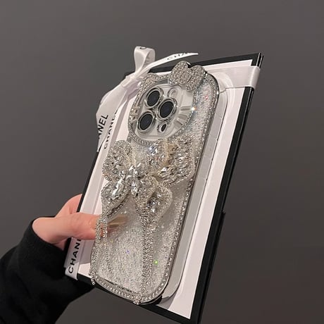大人可愛い iPhone16/16Proケース ダイヤリボン ハート/蝶グリップ iPhone15Pro/14/13Proケース グリッター入り キラキラ ギフトに最適 [M4817]