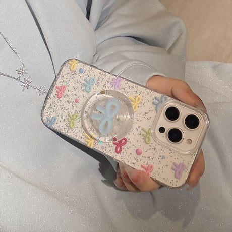 大人可愛い iPhone16/16proケース リボン グリップ付き iPhone14/13pro/12proカバー ラメ入り キラキラ[M5164]