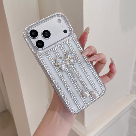 ジュエリー iPhone17Pro/17ケース フリンジダイヤリボン iPhone16Pro/15/14ース 豪華 リボンストラップ付[M6521]