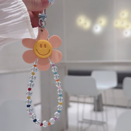 笑顔の花 スマホストラップ キラキラ感 お洒落 バックチャーム キーホルダー iPhone、Xperia、AQUOS、Xiaomi、Galaxy 対応 [M6295]