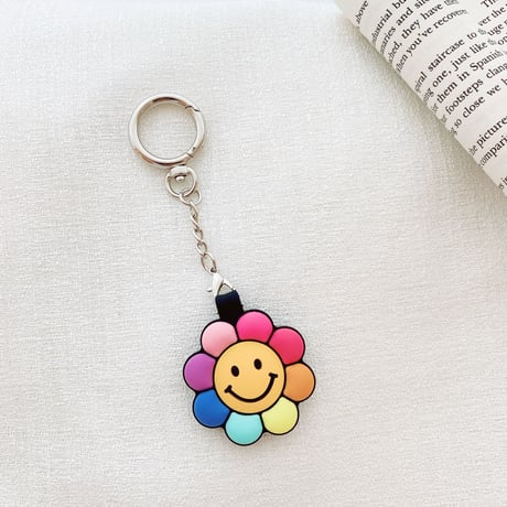 笑顔の花 AirTagケース  sunflower 可愛い エアタグカバー  キーホルダー付きソフトケース 耐久性ありM576