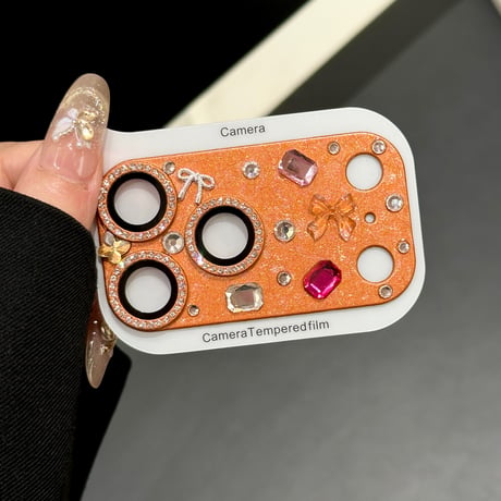 リボンとダイヤデコレンズカバー iPhone17ProMax/17Pro カメラレンズフィルム  金属製  おしゃれ  頑丈 キラキラ 耐久性耐衝撃 [M6506]