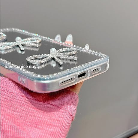 パール/ジュエリーリボン iPhone16/16Proケース 鏡付き iPhone15plus/14pro/13カバー おしゃれ 女子力高い めっちゃ可愛い[M5334]