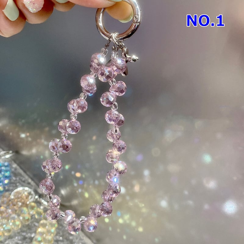 iPhone16」クリスタル ストラップ バックチャーム 高級感 キラキラ