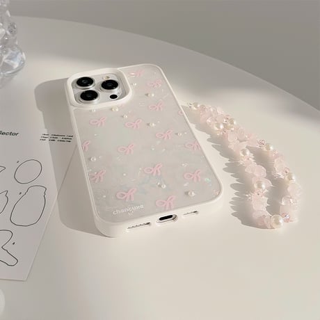 シェル風 iPhone15/15proケース パールリボン柄 iPhone14/13pro/12カバー ストラップ付 女子力アップ[M4524]