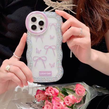 うねうね iPhone15/15proケース リボン柄 ラメ入り iPhone14pro/13/12カバー 女子力高い 落下防止 [M4535]