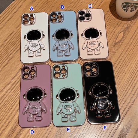 宇宙飛行士グリップ iphone14/13promaxケース ツヤ感金色枠 iphone12mini/SE3/11カバー  高級感  保護力強いソフトケース 落下防止 スタンド機能あり[M1982]