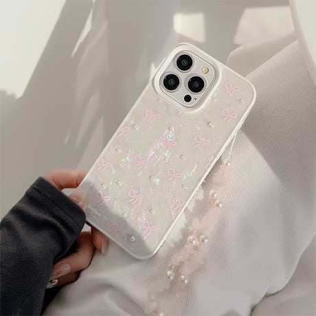 シェル風 iPhone15/15proケース パールリボン柄 iPhone14/13pro/12カバー ストラップ付 女子力アップ[M4524]