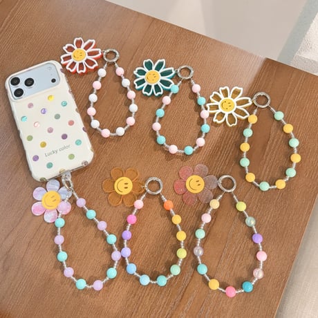 笑顔の花 スマホストラップ キラキラ感 お洒落 バックチャーム キーホルダー iPhone、Xperia、AQUOS、Xiaomi、Galaxy 対応 [M6497]