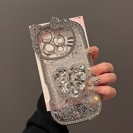 大人可愛い iPhone16/16Proケース ダイヤリボン ハート/蝶グリップ iPhone15Pro/14/13Proケース グリッター入り キラキラ ギフトに最適 [M4817]
