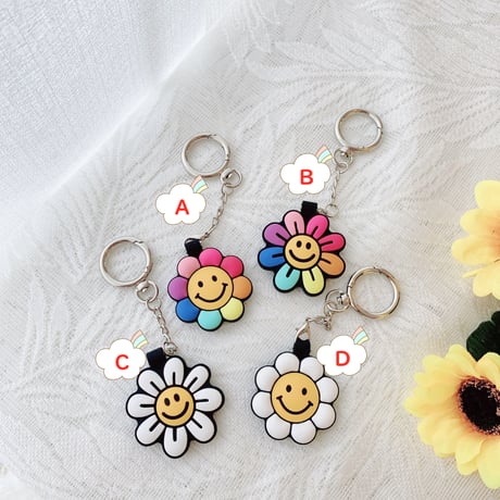 笑顔の花 AirTagケース  sunflower 可愛い エアタグカバー  キーホルダー付きソフトケース 耐久性ありM576