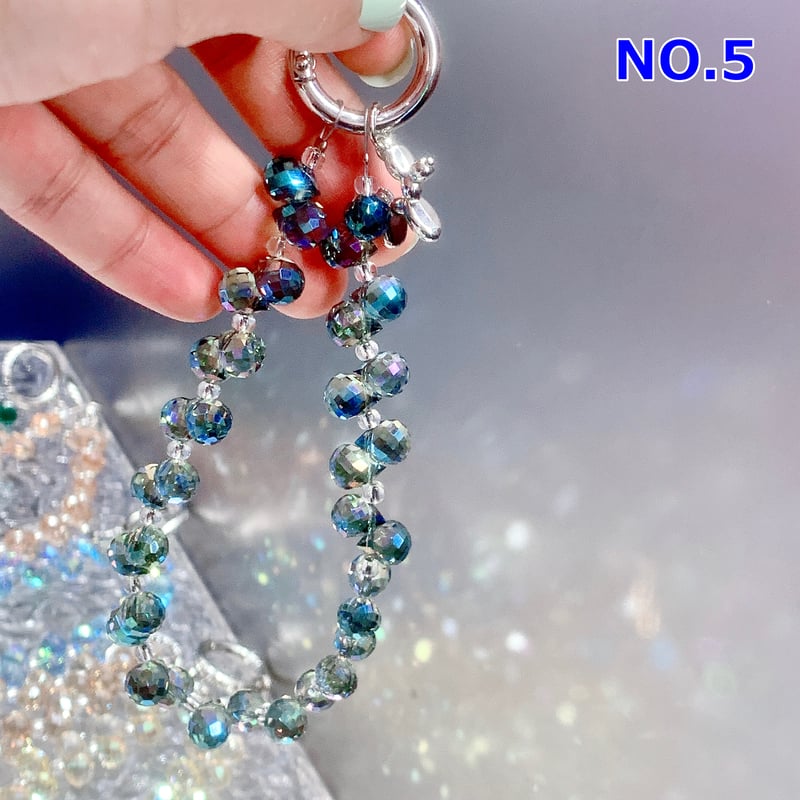 iPhone16」クリスタル ストラップ バックチャーム 高級感 キラキラ