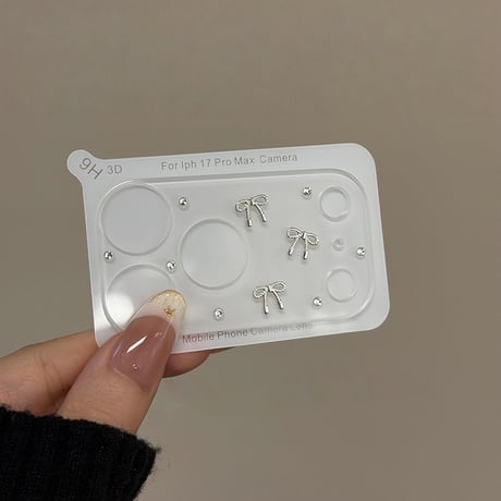 リボンカメラカバー iPhone17Pro iPhone17ProMax レンズフィルム  ダイヤデコ キラキラ  おしゃれ  頑丈 きれい [M6045]