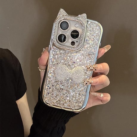 ジュエリーリボン iPhone16/16Proケース 猫耳 キラキラグリッター アイフォン15プロ/14/13proカバー おしゃれストラップ 豪華 [M4827]